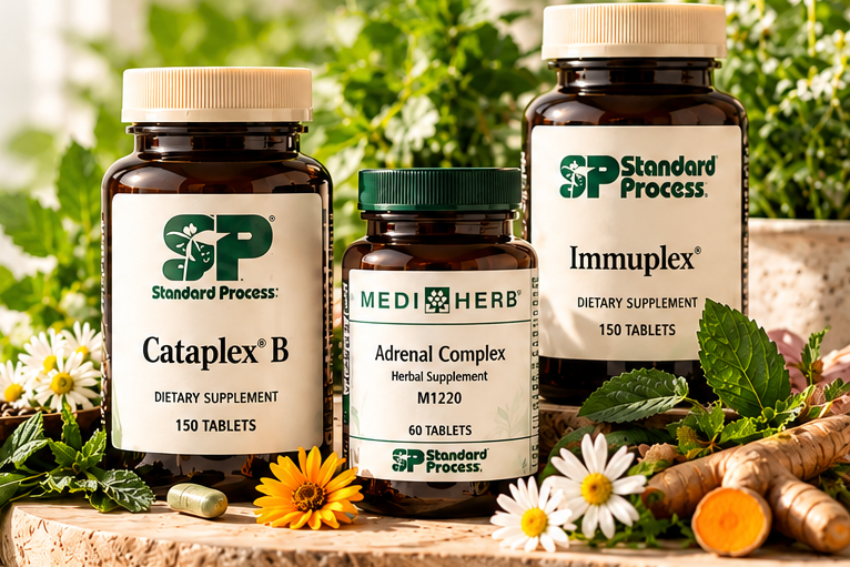 Standard Process Cataplex B and Immuplex with MediHerb Adrenal Complex among fresh herbs and flowers